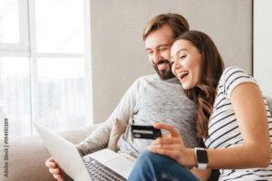 Couple getting an instant roof estimate and buying their new roof online.