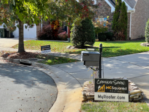 Yard signs for MCSquared Roofing at roof installation jobs in Burlington NC