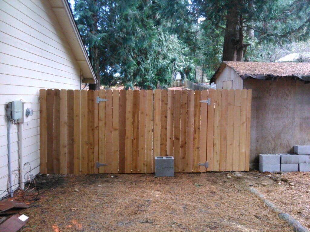 MCSquared Roofing real fence installation project job photo from our Seattle years