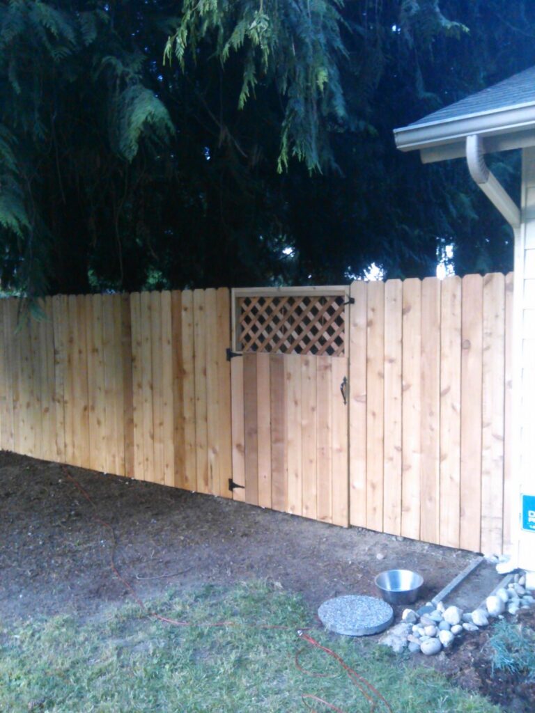 MCSquared Roofing real fence installation project job photo from our Seattle years
