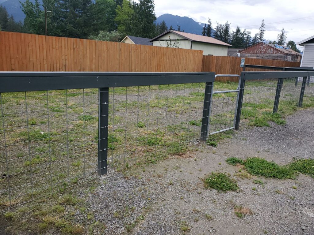 MCSquared Roofing real fence installation project job photo from our Seattle years