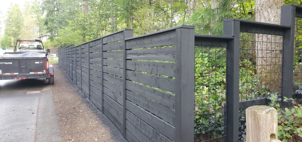 MCSquared Roofing real fence installation project job photo from our Seattle years