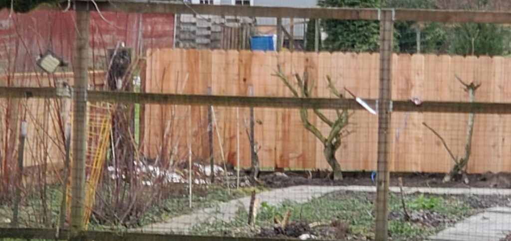MCSquared Roofing real fence installation project job photo from our Seattle years