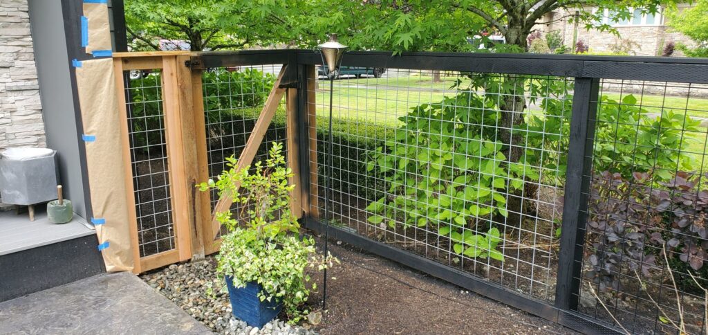 MCSquared Roofing real fence installation project job photo from our Seattle years