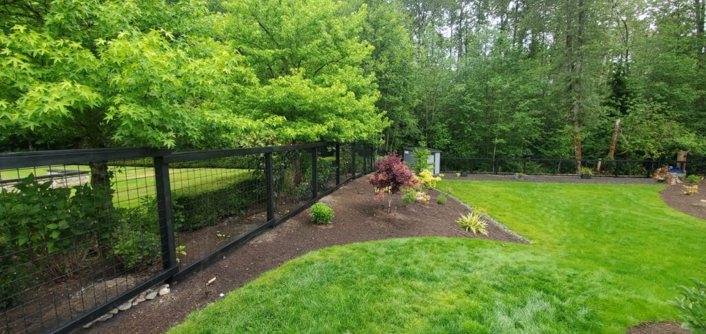 MCSquared Roofing real fence installation project job photo from our Seattle years