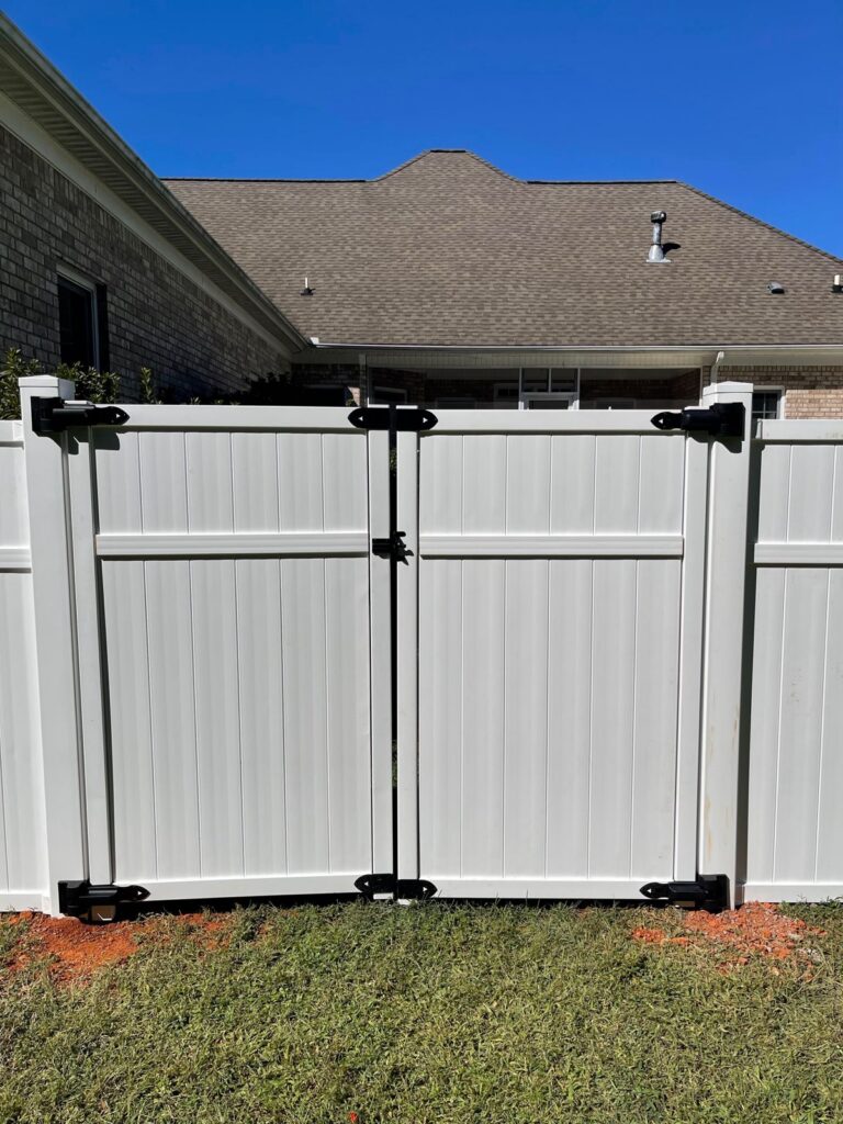 MCSquared Roofing white vinyl privacy fence installed in Burlington, NC area
