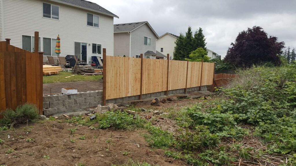 MCSquared Roofing real cedar wood privacy fence job photo from our Seattle years