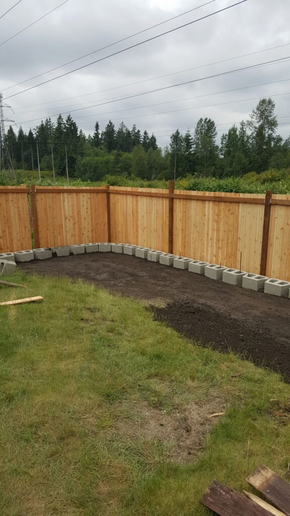 MCSquared Roofing real cedar wood privacy fence job photo from our Seattle years