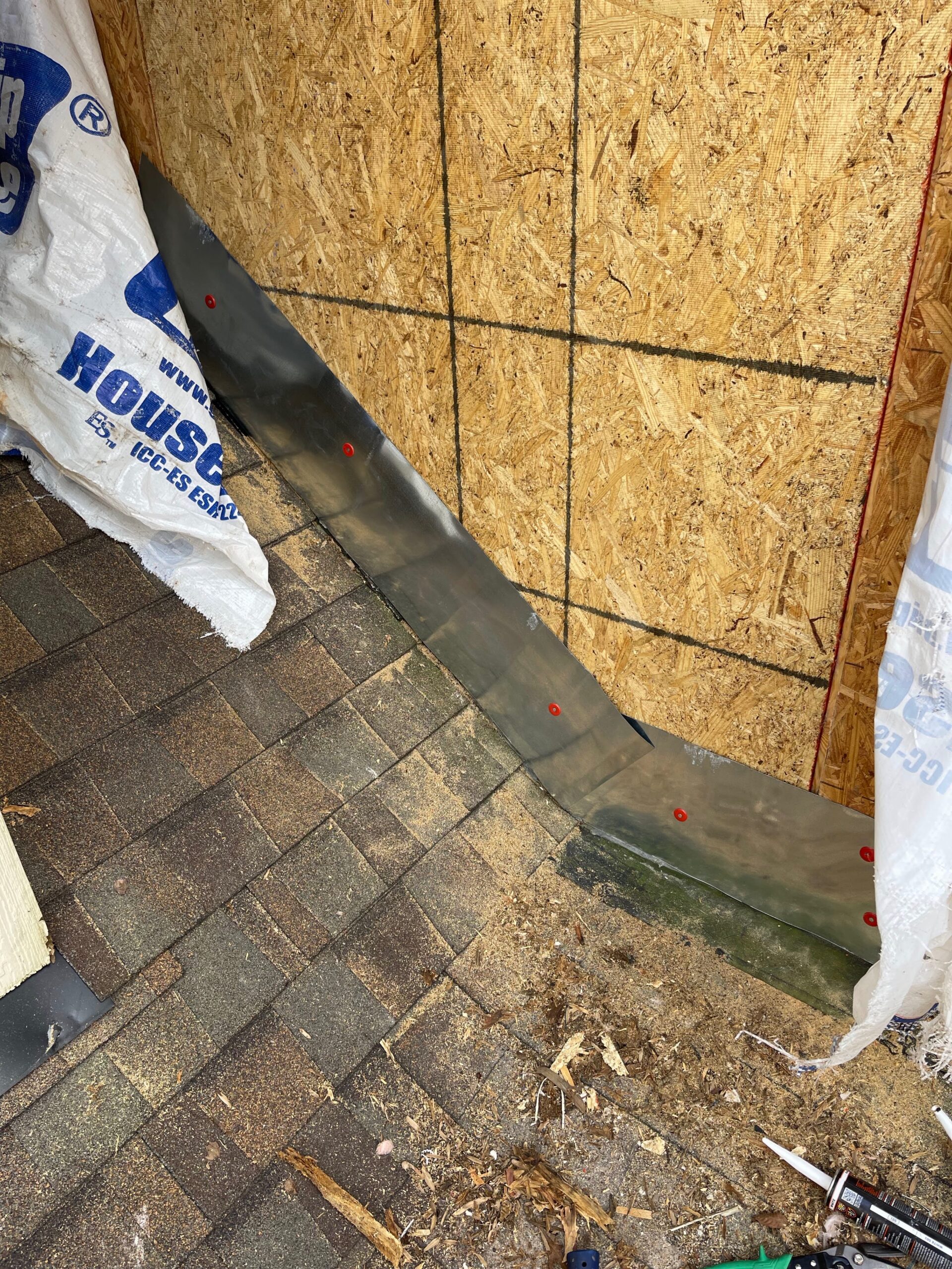 MCSquared Roofing wall step flashing installed on a Burlington NC roof-to-wall transition