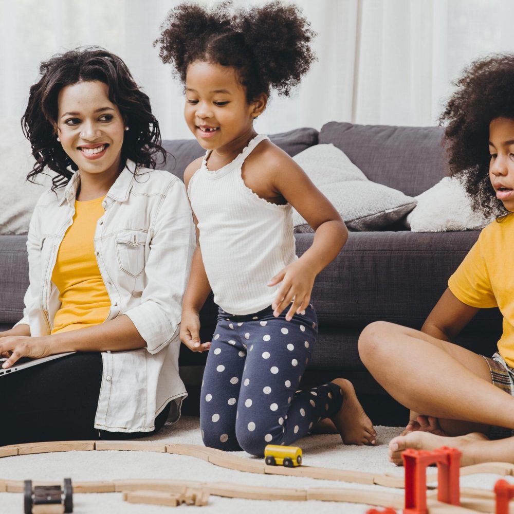 Girl mom work at home with internet laptop effect from covid-19 Order your new roof from the comfort of your home